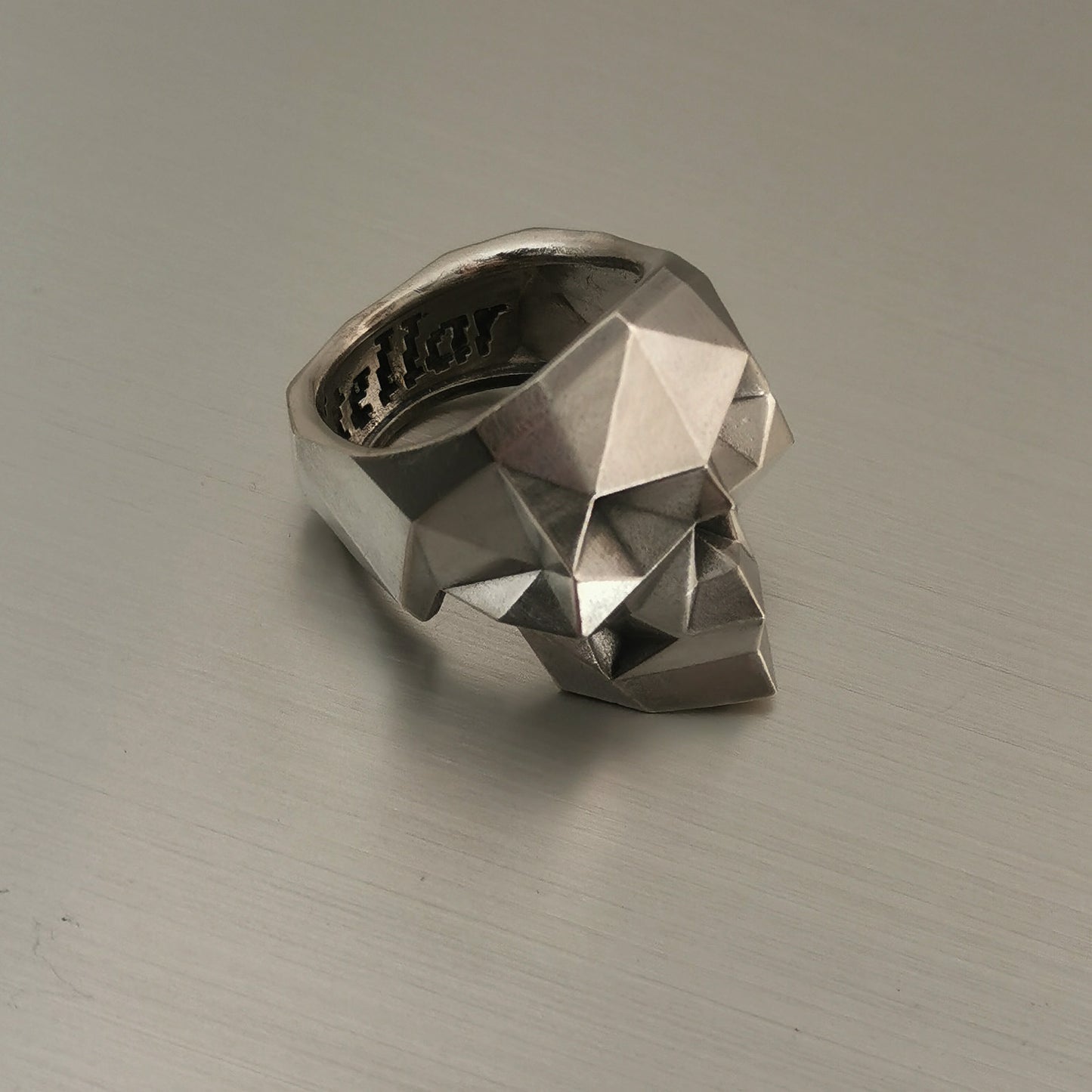 Faceted skull ring