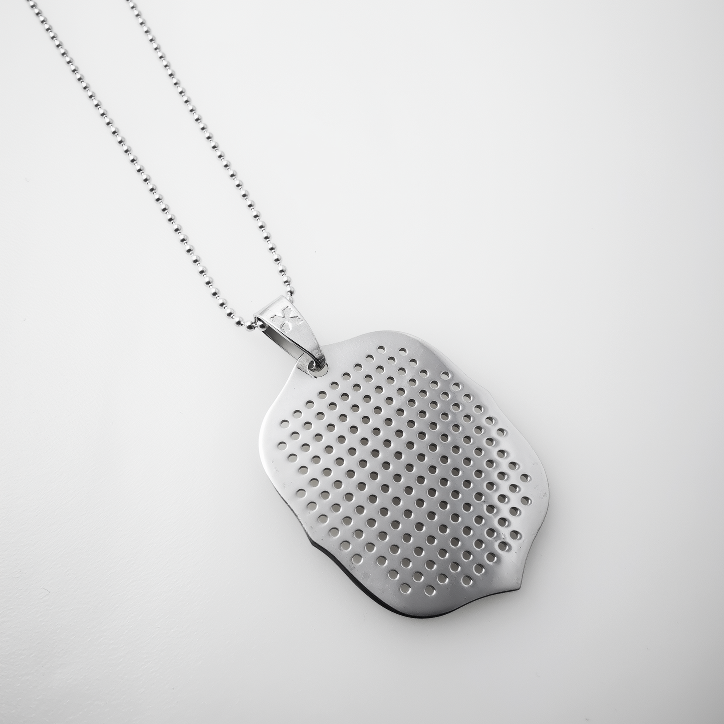 Sarcire Ovalis– Customizable Cross-Stitch Silver Necklace